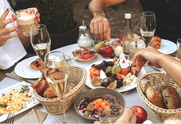 Three people are having breakfast